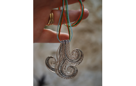 Filigree Wave pendant: silver pendant with ocean wave abstract design