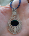 Stunning artisan made filigree "Peacock" pendant necklace handmade from 925 silver shown to size on a woman´s hand