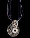 Artisan made filigree "Lucía" pendant necklace handmade in 925 oxidiised and natural silver on a black backdrop