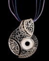 Detail of artisan made filigree "Lucía" pendant necklace handmade in 925 oxidiised and natural silver