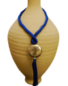 Artisan made ethnic chic art déco pendant necklace made from sabra silk in royal blue and a hammered silver sphere with tassel