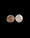 With a swirling fossilised motif, Andaluchic´s Odysseus stud earrings are made from oxidised silver plated zamak