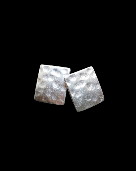 Front view of Andauchic´s "Hammered Rectangular" stud earrings  in oxidised silver plated zamak on a black background
