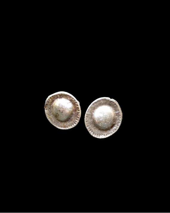 Front view of Andaluchic´s "Sombrero" stud earrings made in oxidised silver plated zamak on a black background