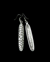 Front & back view of Andaluchic´s "Zafra" long drop patterned earrings made from oxidised silver plated zamak on black backdrop