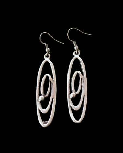 Front view of Andaluchic´s "Athena" long drop earrings made from oxidised silver plated zamak shown on a black background
