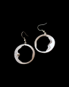 Front and back view of Andaluchic´s "Clair de Lune" moon drop earrings made in oxidised silver plated zamak on a black backdrop