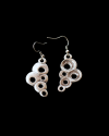 Front & back view of Andaluchic´s "Bubbles" drop earrings made from oxidised silver plated zamak set on a black background
