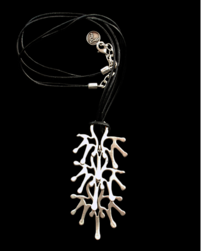 Front view of Andaluchic´s "Tree of Life" pendant necklace made from oxidised silver plated zamak on a black background