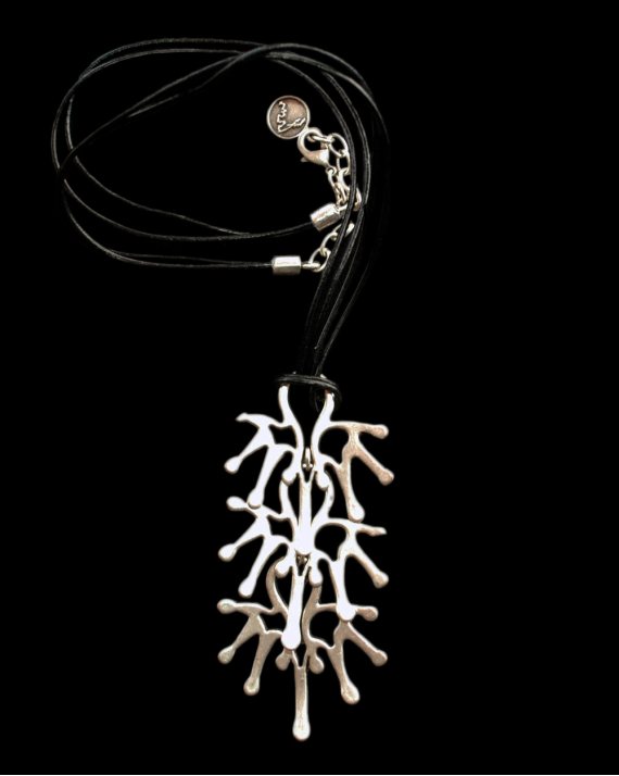 Front view of Andaluchic´s "Tree of Life" pendant necklace made from oxidised silver plated zamak on a black background