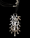 Detail of Andaluchic´s "Tree of Life" pendant necklace made from oxidised silver plated zamak on a black background