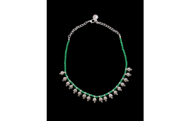 Ethnic style necklace with green beads and silver plated zamak charms