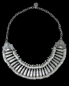 Closer front view of Andaluchic´s retro vintage style "Nomad" necklace made from aged silver plated zamak on a black background