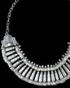 Detail of Andaluchic´s retro vintage style "Nomad" necklace made from aged silver plated zamak on a black backdrop