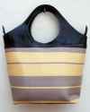 Large black leather tote with striped fabric in soft grey and muted yellow