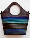 Large brown leather tote bag with striped fabric in turquoise, green, black to gold