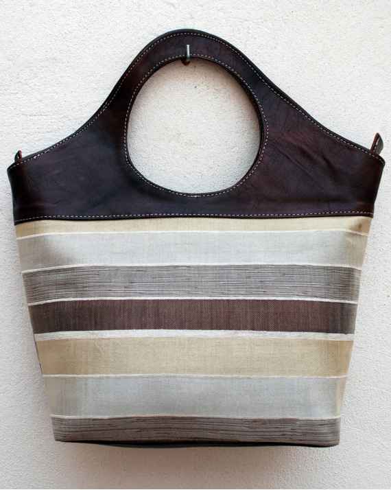 Large brown tote bag in goatskin with striped fabric in cream, white, brown and taupe