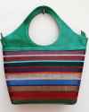 Large green handbag in soft goatskin with multicolored striped fabric