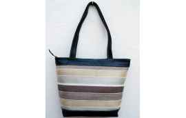 Large brown leather shoulder bag with striped fabric in white, cream and beige