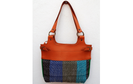 Calfskin shoulder bag with blue, turquoise, black and khaki upcycled striped cotton