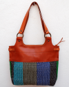 Back view of Andaluchic´s Anillas" shoulder bag up-cycled hand-woven cotton in blue, green & turquoise tones with tan leather