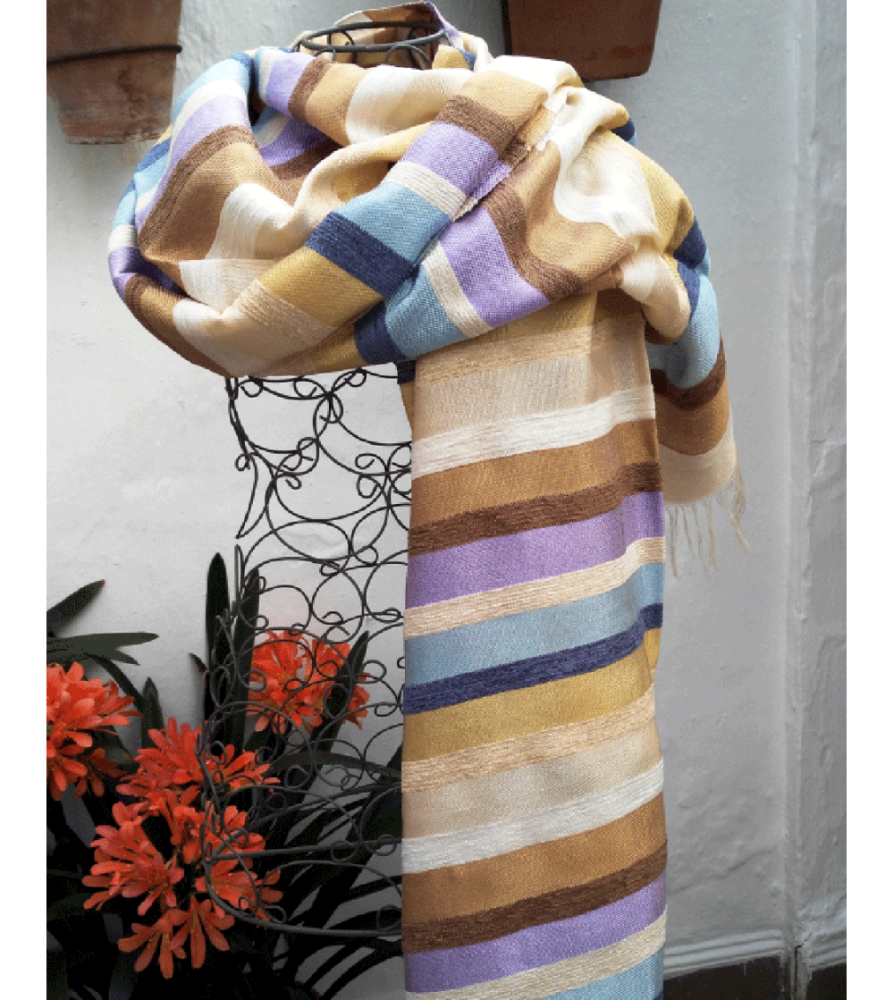Handwoven shawl in stripes of pastel colors, white, pink, blue and mauve