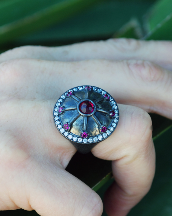 Oxidised silver Byzantine style Line Shield Cocktail Ring inserted with pinky red zircons & clear zircons all around the edge