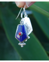 Oblong point drop earrings made in sterling silver inset with semi-precious stones of lapiz lazuli with small central red coral