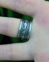 Back view of handmade chunky wide oxidised silver rings with an ethnic pattern from Andaluchic