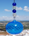 Sphère de verre soufflée: talisman, boule de sorcière et attrape-soleil