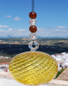 Sphère de verre soufflée: talisman, boule de sorcière et attrape-soleil