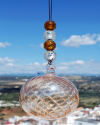 Sphère de verre soufflée: talisman, boule de sorcière et attrape-soleil