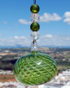 Sphère de verre soufflée: talisman, boule de sorcière et attrape-soleil