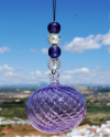 Sphère de verre soufflée: talisman, boule de sorcière et attrape-soleil