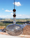 Sphère de verre soufflée: talisman, boule de sorcière et attrape-soleil