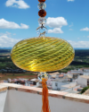 Boule de verre soufflée avec pompon : talsiman, boule de sorcière ou attrape-soleil