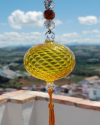 Blown glass sphere with tassel: oriental talisman, witchball, suncatcher