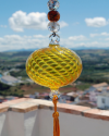 Boule de verre soufflée avec pompon : talsiman, boule de sorcière ou attrape-soleil