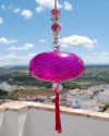 Boule de verre soufflée avec pompon : talsiman, boule de sorcière ou attrape-soleil