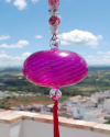 Blown glass sphere with tassel: oriental talisman, witchball, suncatcher