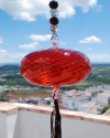 Blown glass sphere with tassel: oriental talisman, witchball, suncatcher