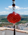 Blown glass sphere with tassel: oriental talisman, witchball, suncatcher