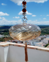 Blown glass sphere with tassel: oriental talisman, witchball, suncatcher