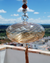 Boule de verre soufflée avec pompon : talsiman, boule de sorcière ou attrape-soleil