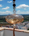 Boule de verre soufflée avec pompon : talsiman, boule de sorcière ou attrape-soleil