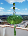 Blown glass sphere with tassel: oriental talisman, witchball, suncatcher