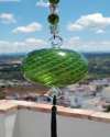 Boule de verre soufflée avec pompon : talsiman, boule de sorcière ou attrape-soleil