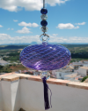 Boule de verre soufflée avec pompon : talsiman, boule de sorcière ou attrape-soleil