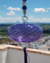 Boule de verre soufflée avec pompon : talsiman, boule de sorcière ou attrape-soleil