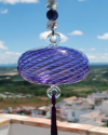 Blown glass sphere with tassel: oriental talisman, witchball, suncatcher